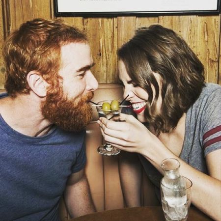 Andrew Santino and a fellow comic Beth Stelling shared a drink from the same glass.